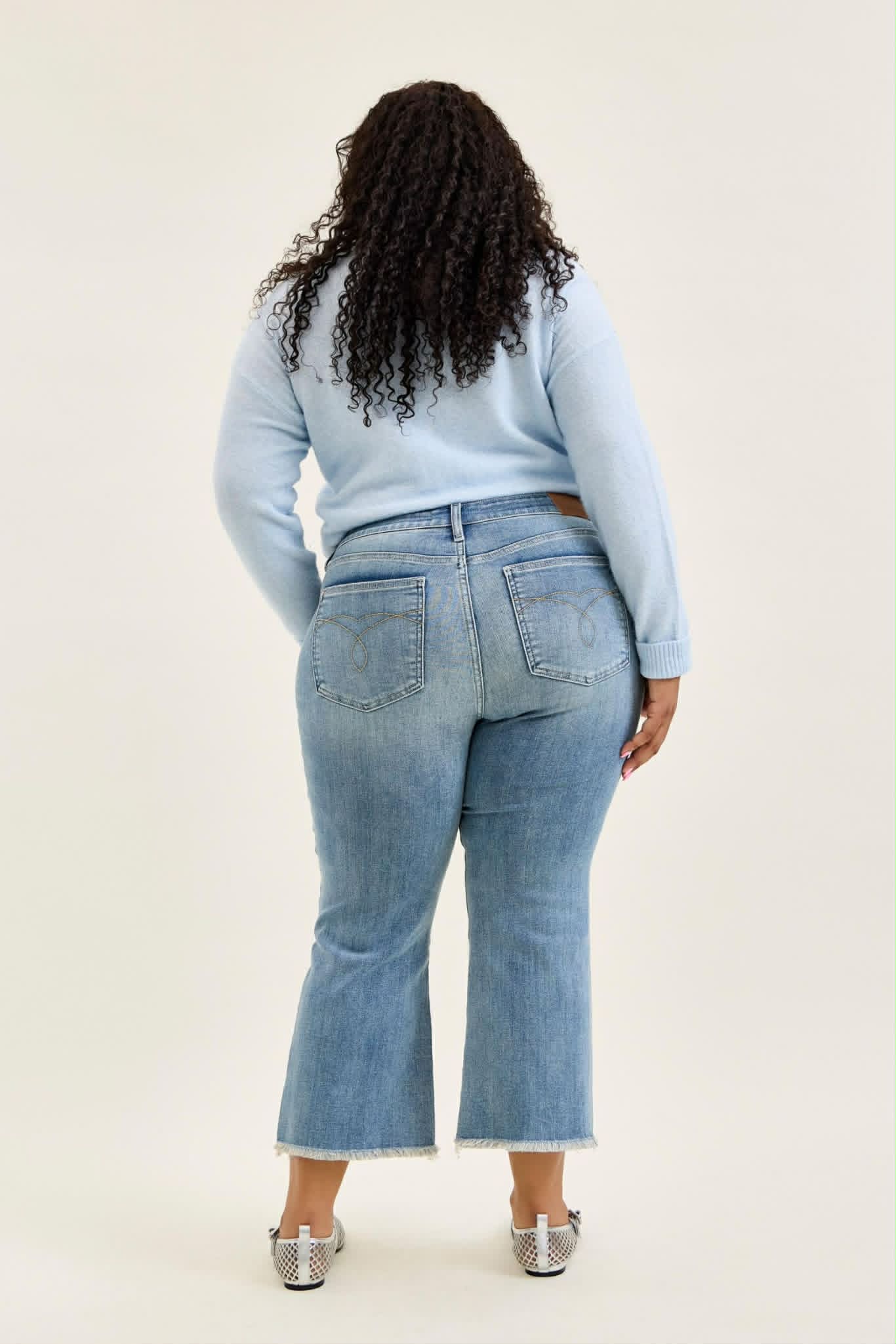 Judy Blue Mid Rise light wash kick flare PLUS