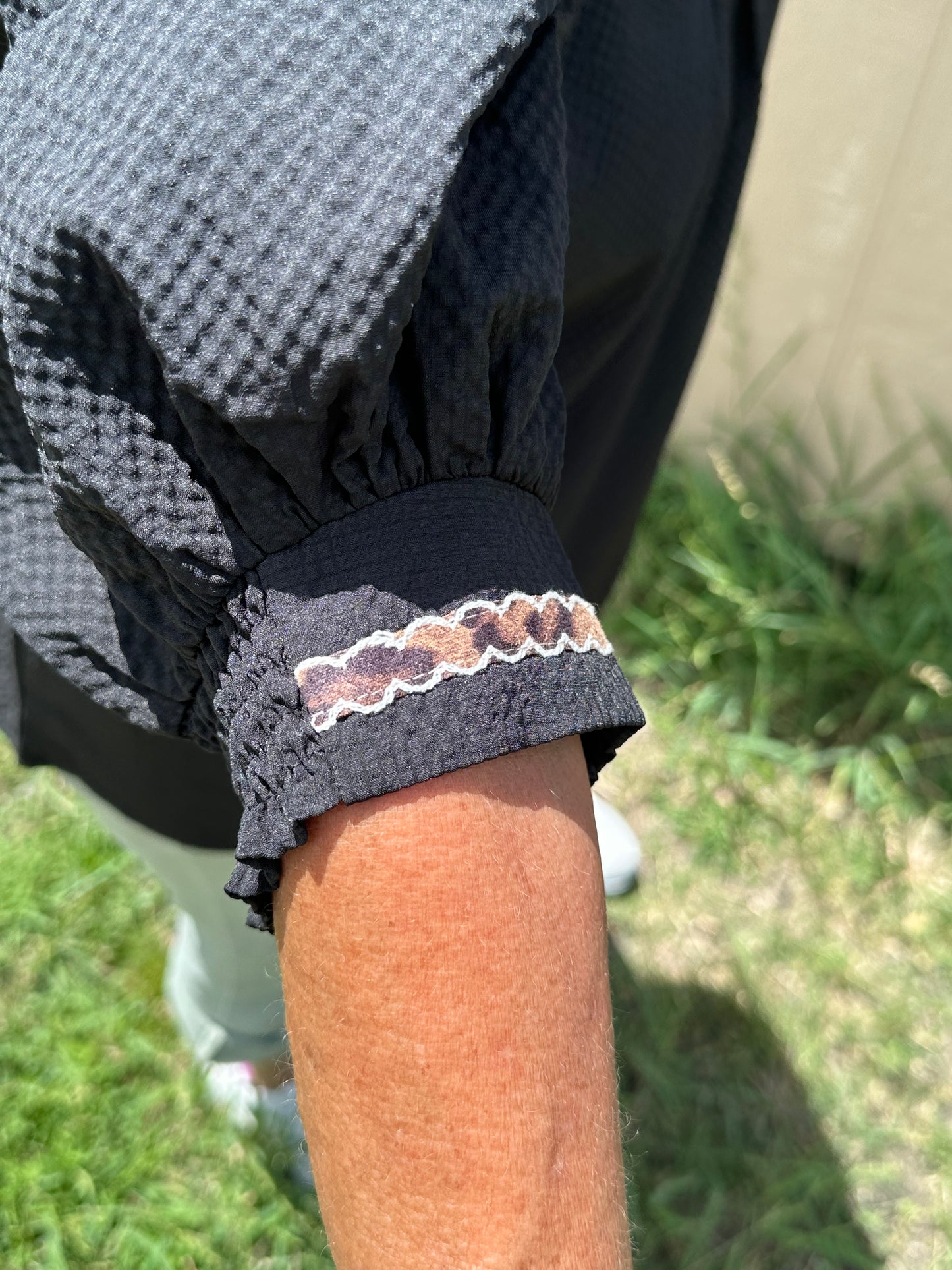 Lined leopard Umgee Top