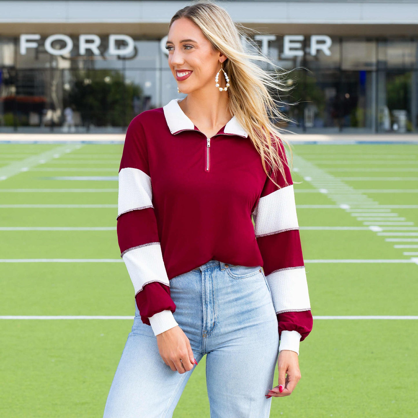 Maroon and white long sleeve half zip pullover top
