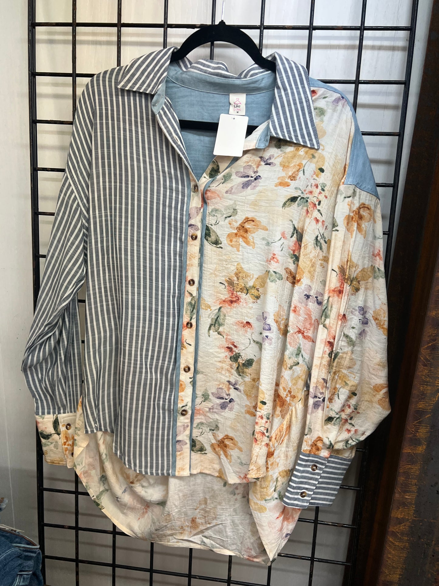 Dressed in denim and floral blouse